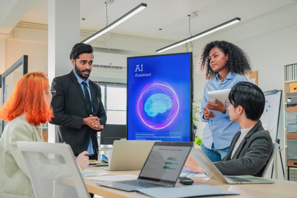Diverse business professionals collaborating with AI virtual assistant on data strategy